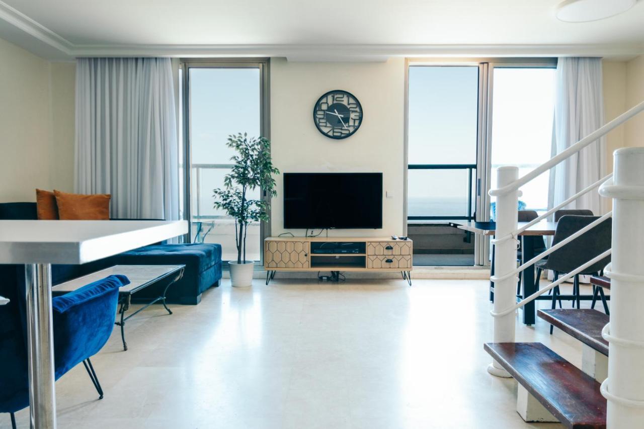 Almog Beach Apartments מגדלי חוף הכרמל חיפה Esterno foto